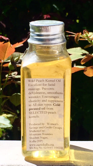 Wild Peach oil is an excellent softener and moisturizer for face, hands and hair. Well known therapeutic body massage oil. Recommended for prematurely aged, sensitive, inflamed and dry skin. Cold pressed oil from Peach kernels. Body Oil, 100% natural, handmade, Natural oils, Skin Care, Himachal Oils, Himalayan Salt, Mountain Bounties, Himalayan people Care, Essential oils, Cold Pressed oils, Moisturising oils, Moisturising creams